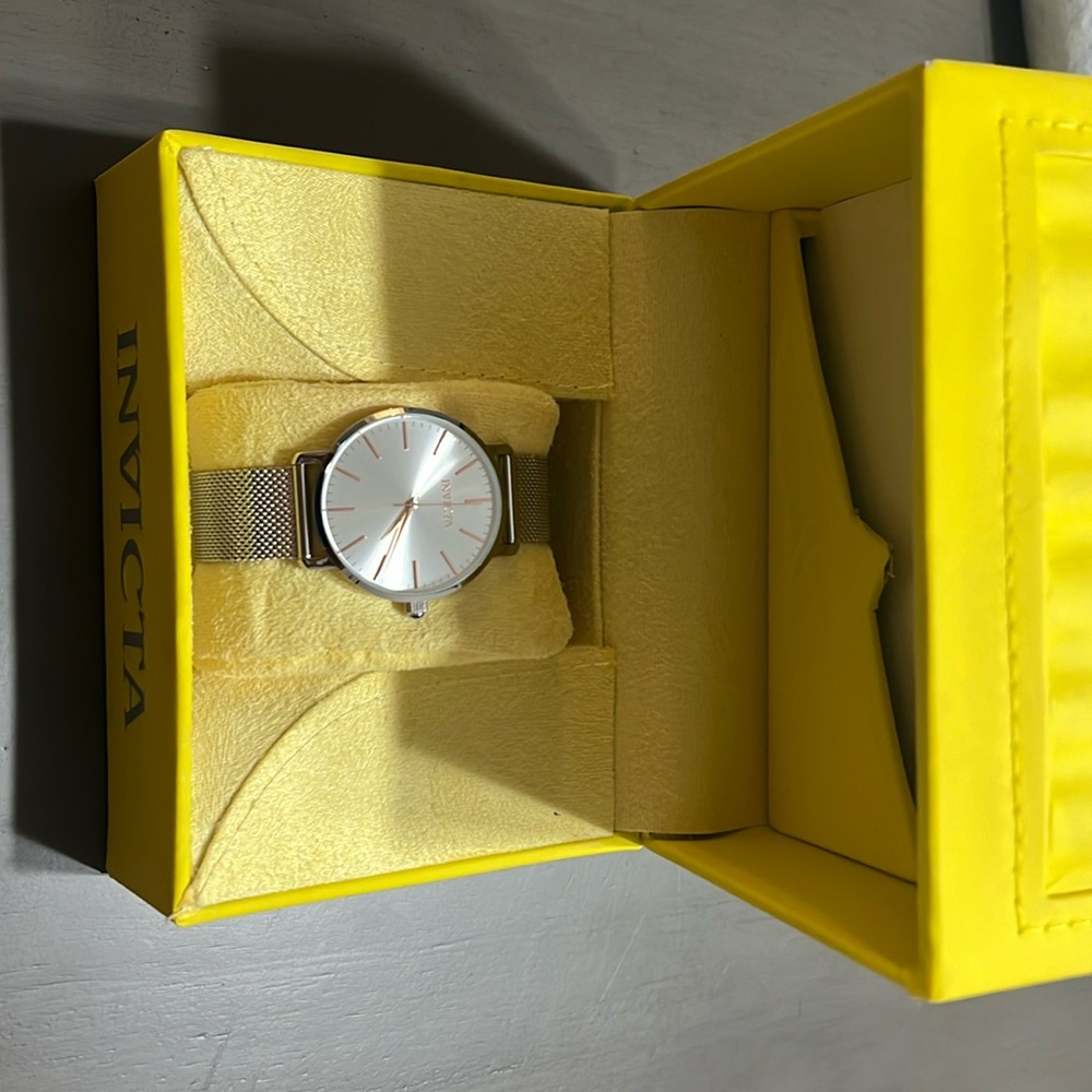 Silver invicta woman’s watch